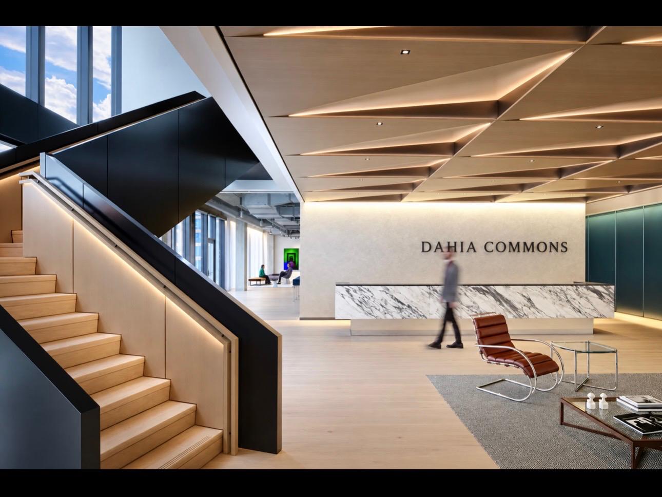 Dahia Commons lobby with sculptural staircase